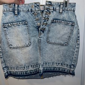 Jean skirt with tag still on.